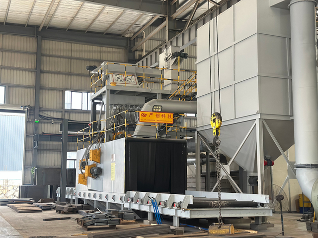 Roller conveyor type shot blasting cleaning machine